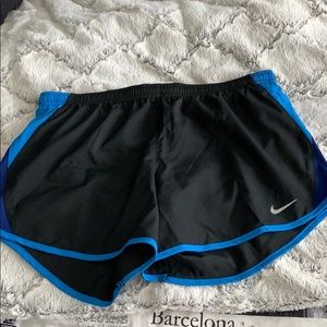 Blue/purple and black nike running shorts